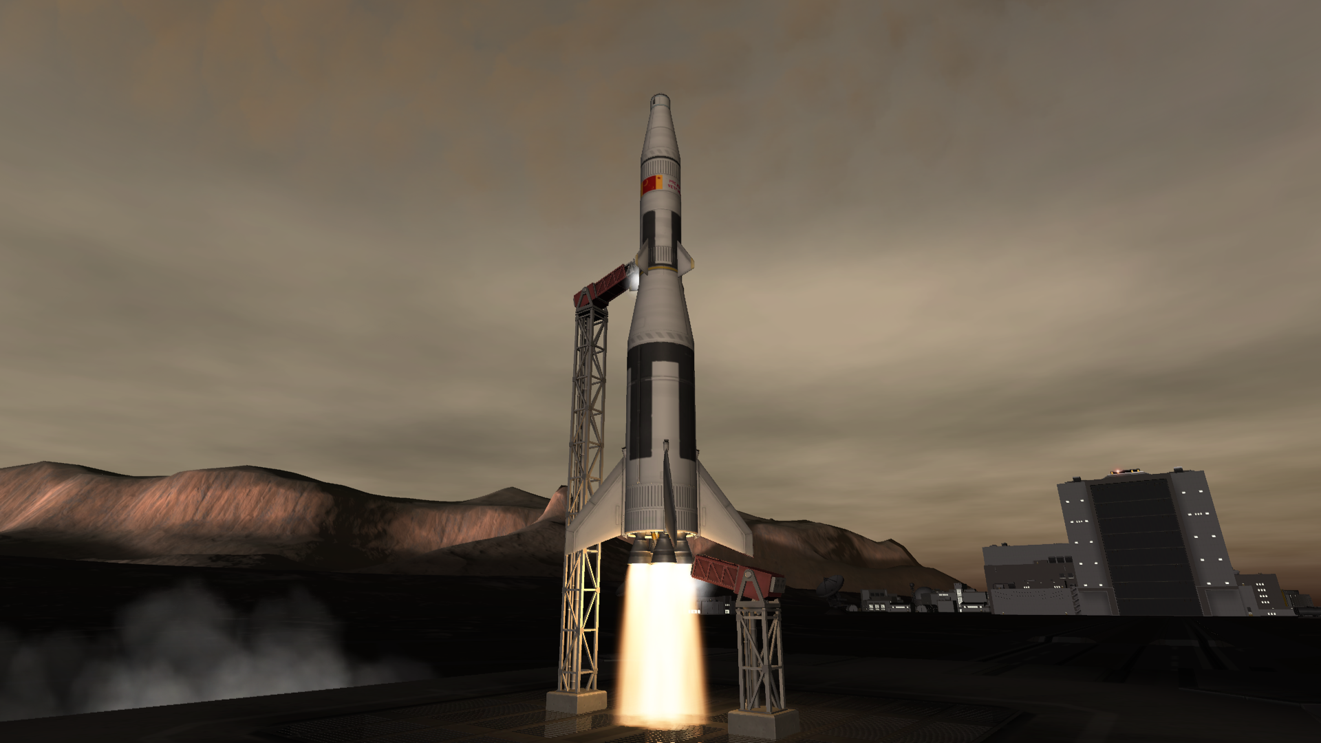 A rocket leaves the pad on the brown planet Derbin, its four engines spouting yellow flame. The rocket is a two-stage vehicle, with a parachute and payload peeking out of the cone on its top. Below that stage is a relatively thin fuel tank with the flag and PROJECT VERY HIGH written on the side along with small winglets. Another cone at the bottom connects it to a wider, equally-long stage that ends in covered engines and winglets.