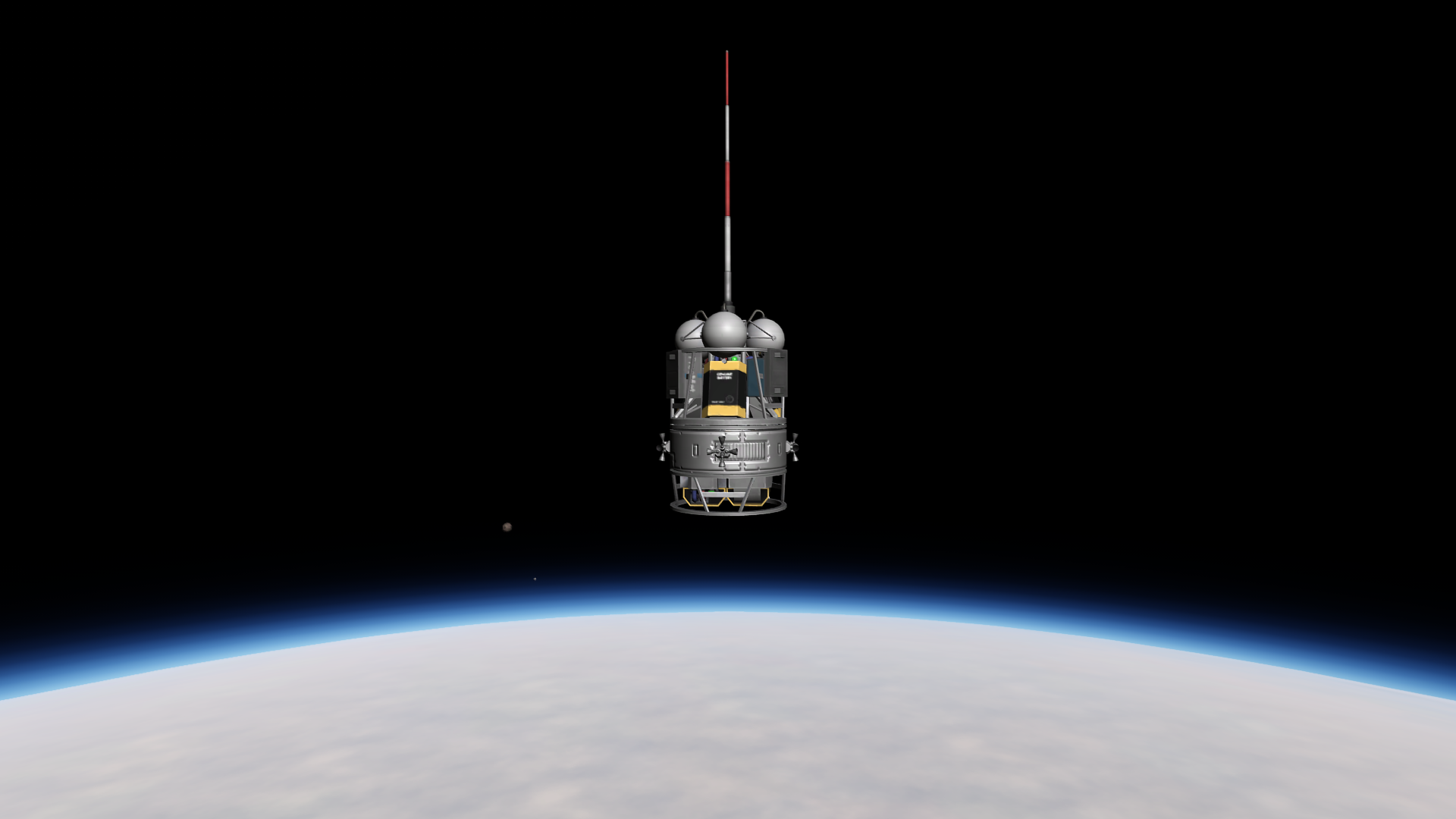 The Virga E probe, a cylinder with tiny thrusters and a cylindrical framework on either side. The bottom framework holds two batteries, the top framework three batteries and science equipment. Above the top framework is a trio of fuel tanks and an antenna.