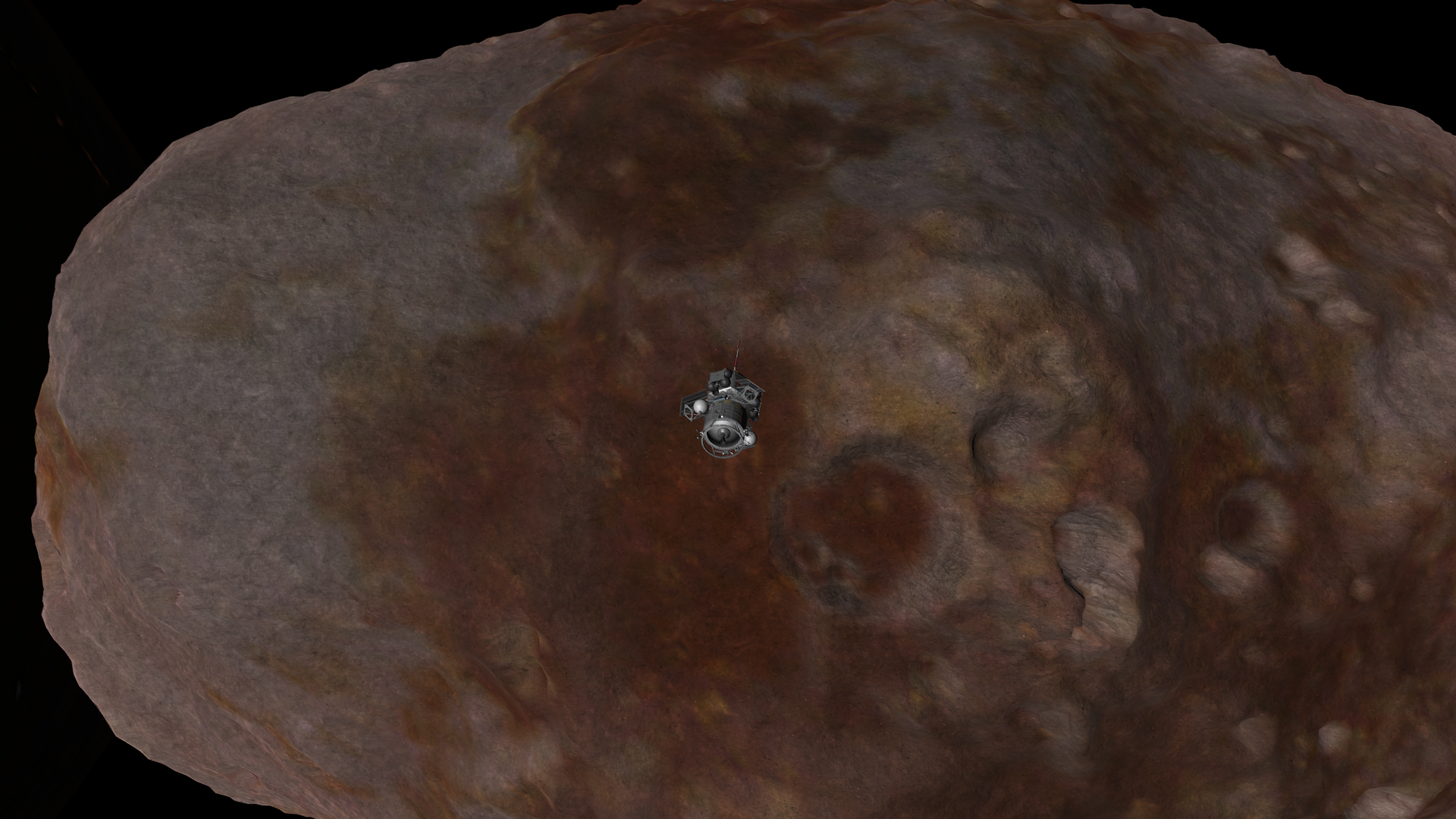 Another picture of the spacecraft over Statmun- this time it's over a deep red equatorial patch, and a knoblike edge of Statmun is visible to the left.